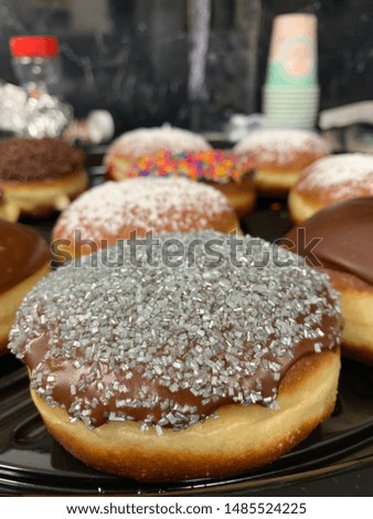 Homemade chanukah donut with silver sprinkles