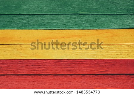Background wood green, yellow, red old retro vintage style, rasta reggae flag
