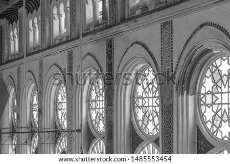Indo Saracenic style of architecture with beautiful window view with sunlight. Low light black and white photography chennai india