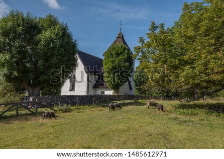 The church at the viking burial mounds on the island Adelsö at the viking town on the island Birka close to Stockholm