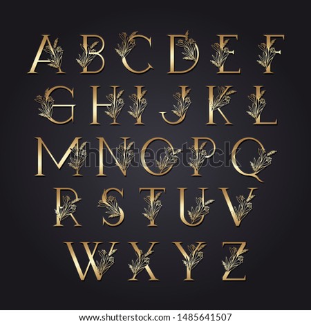 set of golden letters with leafs