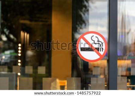 no smoking sticker on the door