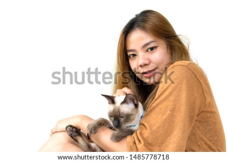 Asian women playing with cats isolate on white background. Asian beautiful girls playing with kittens.