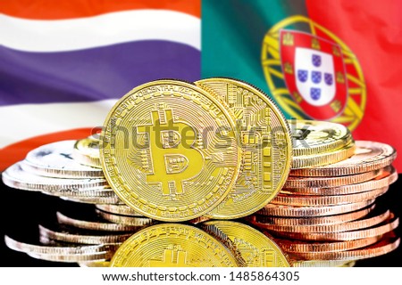 Concept for investors in cryptocurrency and Blockchain technology in the Thailand and Portugal. Bitcoins on the background of the flag Thailand and Portugal.