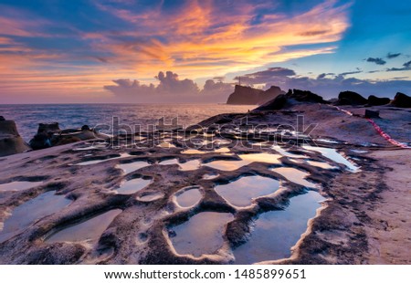 Strange rocks in Yehliu Geopark Park on the northern coast of Taiwan Royalty-Free Stock Photo #1485899651