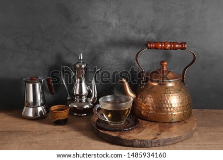 Group of arabic tea in glass and metal tea pot,Tea set with a blank space for a text