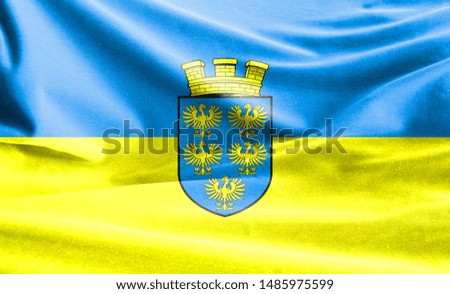 Realistic flag of Lower Austria on the wavy surface of fabric