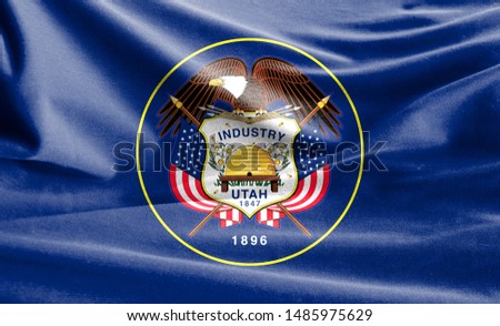 Realistic flag State of Utah on the wavy surface of fabric