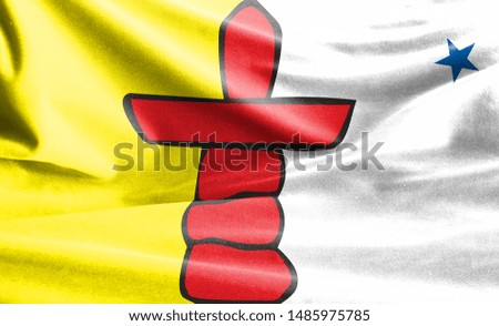 Realistic flag of Nunavut on the wavy surface of fabric