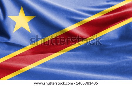 Realistic flag of Congo Democratic on the wavy surface of fabric