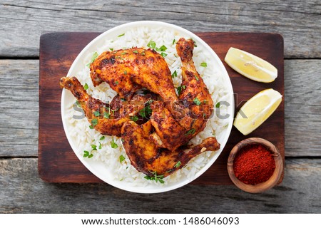  Tandoori chicken with jasmine rice and pita bread, indian cuisine. Royalty-Free Stock Photo #1486046093