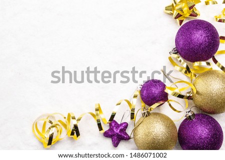 Christmas decorations lying on a light background. Copy space.