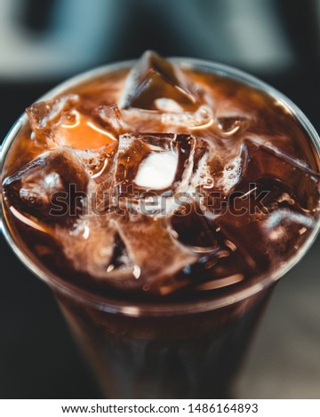 A close up picture of an iced coffee