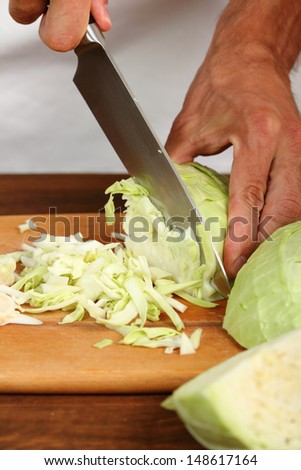 Cooking Cabbage. Cutting.