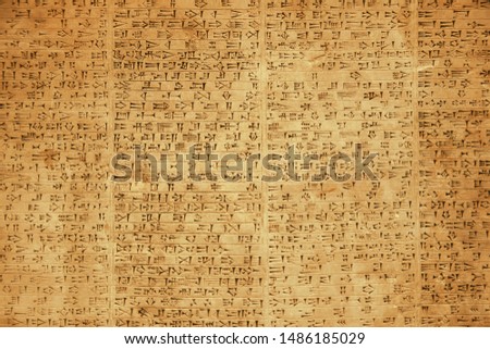 Background of ancient Babylonian or Persian cuneiform symbols on rock tablets Royalty-Free Stock Photo #1486185029