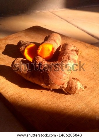 This is turmeric, a seasoning.  Nice spice exhibit with close style. Format Jpeg