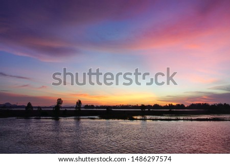 View of Mekong River at sunset in Dong Thap, Vietnam. The Mekong basin is one of the richest areas of biodiversity in the world.