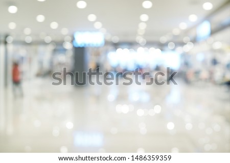 Abstract blurred interior of a modern shopping mall. Concept sale clearance in shopping mall.