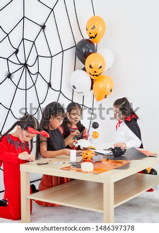 Happy Halloween, Group of asian children girls costumes Halloween party  have a fun, trick or treat at home