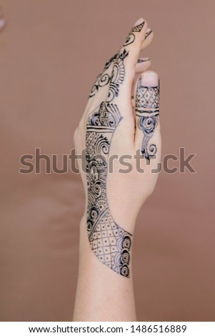 Beautiful henna design on hands