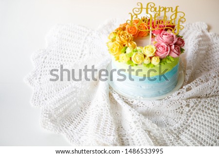 Birth day cake beautiful roses buttercream on top and white cloth background  close up copy space
