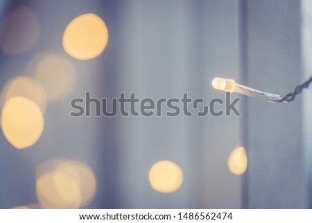 Closeup picture of christmas lightning and decoration, shiny background