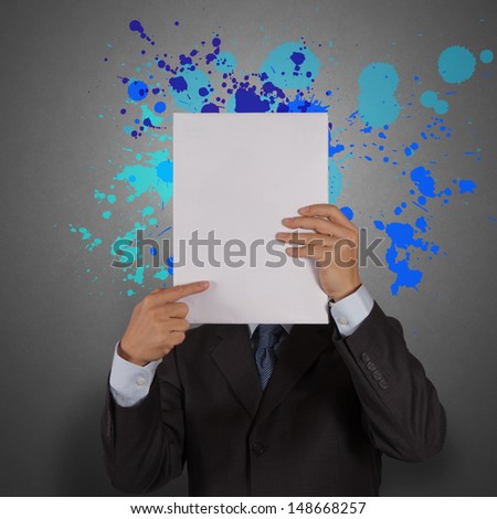 businessman with blank book and splash colors choice as concept