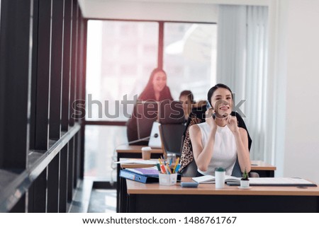 Portrait of Successful smiling businesswoman working in the office