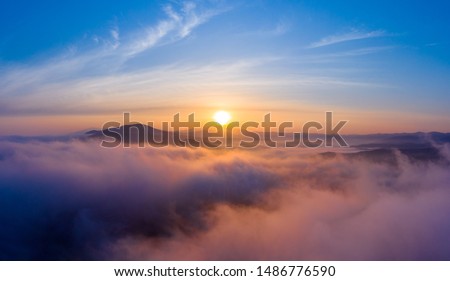 Dawn over the sea and mountains in the Primorsky Territory, Russia Royalty-Free Stock Photo #1486776590