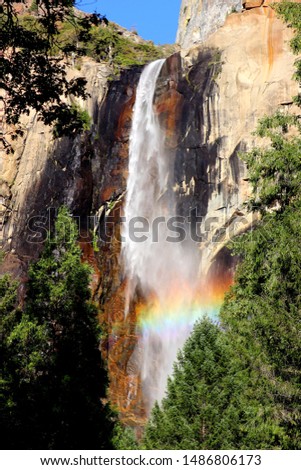 Amazing waterfall creating a rainbow due to a perfect light