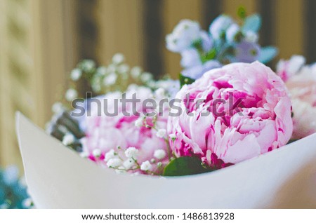 Bouquet of flowers close-up. Joyful mood, a gift from a loved one. Summer flowers. Peonies, hydrangea and others. Soft focus.