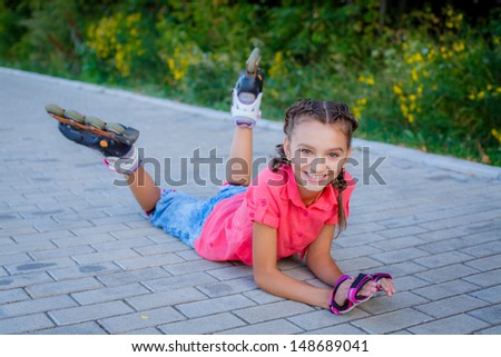 beautiful teenage girl on roller skates