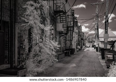 Black & white back alley with fire escapes in midwest Indiana town