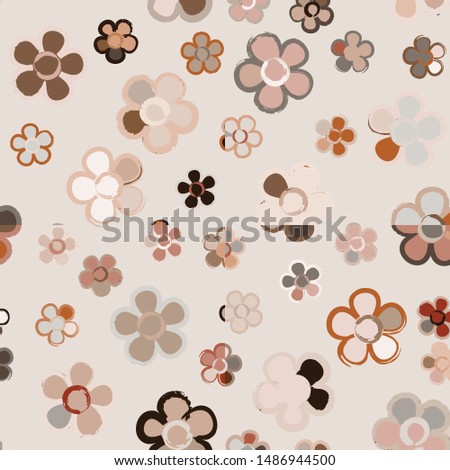 Seamless pattern with randomly arranged primitive images of flowers. Autumn colors.
