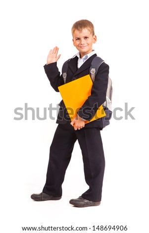 Schoolboy with book isolated on a white background