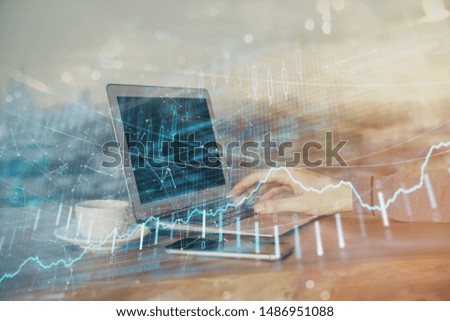 Double exposure of hands and notepad with business icons. Concept of international business.