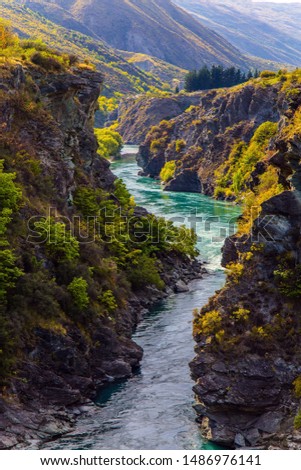 Gorge and river Kawarau between Queenstown and the town of Cromwell. The river with bright green water. Incredible Adventures in New Zealand 