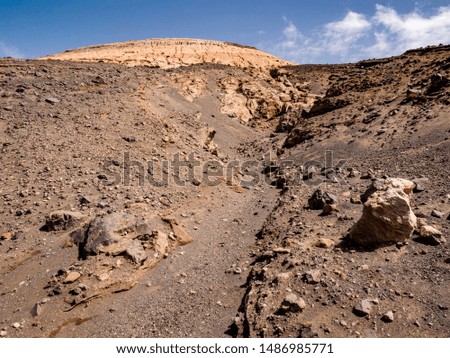 The landscape of the volcano of the island of Vulcano during the climb to the crater. Martian landscape of Vulcano during a summer day, Aeolian Islands, Sicily, Italy.