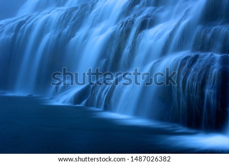 Long exposure photo of waterfall, view of the beautiful Dynjandi waterfall in Westfjords of Iceland, Europe. 