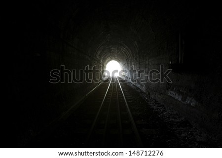Natural light at the end of the tunnel.  Royalty-Free Stock Photo #148712276