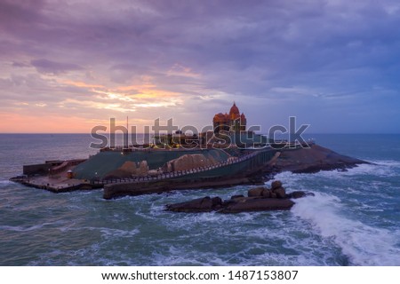Kanyakumari - Vivekananda Rock Memorial & Thiruvalluvar Statue photographs while sunrise. Aerial Photos of Vivekananda Rock & Thiruvalluvar Statue, Kanyakumari Royalty-Free Stock Photo #1487153807