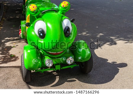 big green head from a toy car for children with big eyes