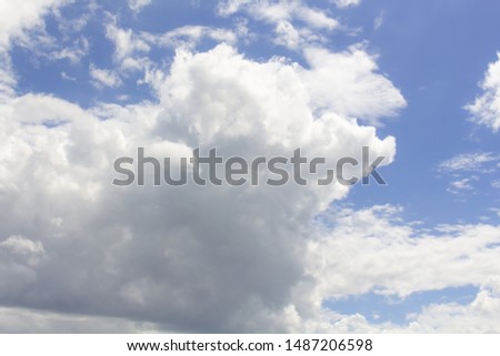 White clouds in the blue sky background,