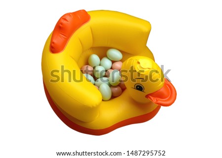 yellow duck boat and eggs for children to play,isolate