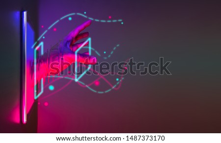 Abstract hand get off from smartphone technology with neon graphic line. Futuristic cyberpunk colour network concept with copy space. Royalty-Free Stock Photo #1487373170