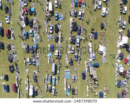 Birds eye aerial photography of a car boot sale market