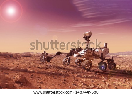 Mars explores the surface of the planet.  Elements of this image were furnished by NASA for any purpose Royalty-Free Stock Photo #1487449580