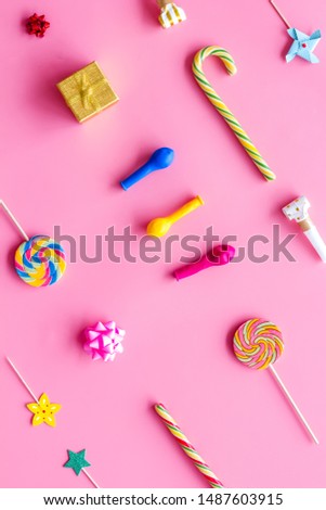 Decoration for party layout on pink background top view