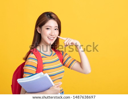 Portrait of beautiful asian  student with looking gesture