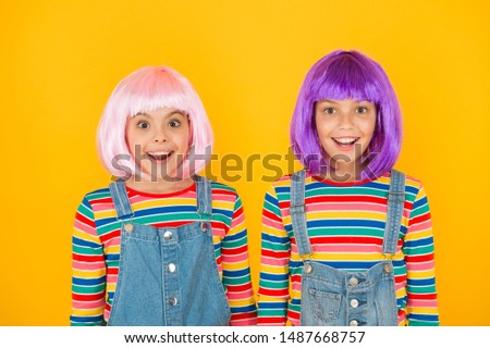Anime convention. Happy little girls. Anime fan. Cheerful friends in colorful wigs. Anime cosplay party concept. Animation style characterized colorful graphics vibrant characters fantastical themes.